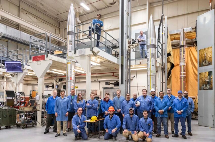 APEP team lead, Aroh Barjatya, is at the top center, standing next to the guardrails on the second floor.