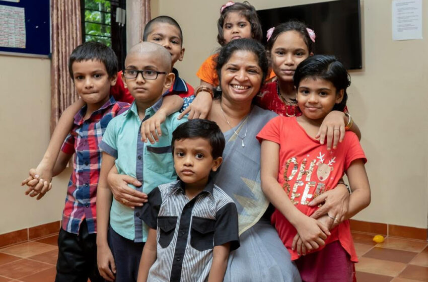 Sheeba Ameer with some of the children whose lives have been touched by Solace, her nonprofit providing curative and palliative care and support.