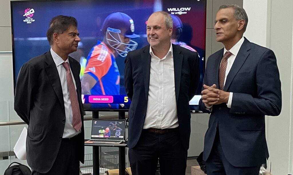 Washington Freedom owner Sanjay Govil (left), International Cricket Council CEO Geoff Allardice (center), and Deputy Secretary of State Richard Verma engage in a conversation during the "From Bouncers to Boundaries" event hosted by the Department of State on June 12, 2024.