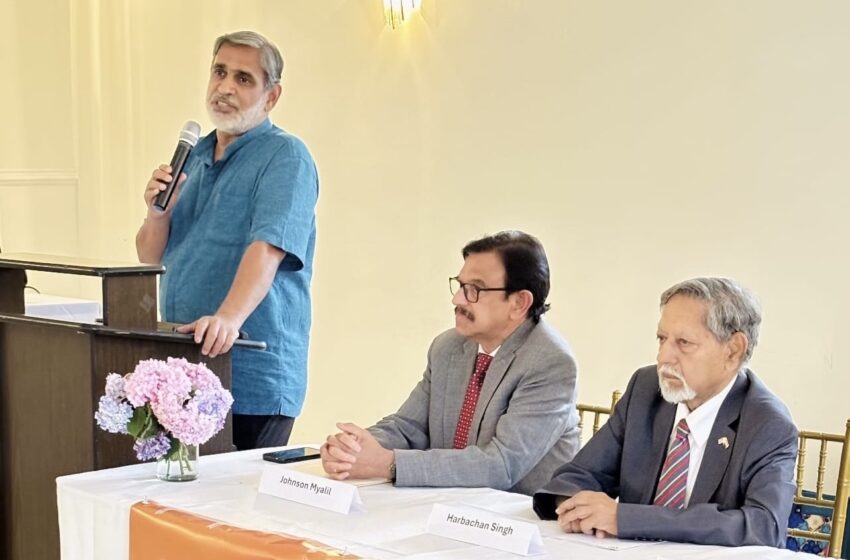 Former Indian diplomat Venu Rajamony speaking at an event hosted by the Indian Overseas Congress, Washington, DC chapter, in Fairfax, VA, on June 19. Also seen are IOC DC Chapter President Johnson Myalil (center) and IOC USA Secretary General Harbachan Singh.