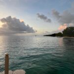 A magnificent view of Smitons Bay during sunset from the piers of the Fish Pot restaurant on the western coast of Barbados.